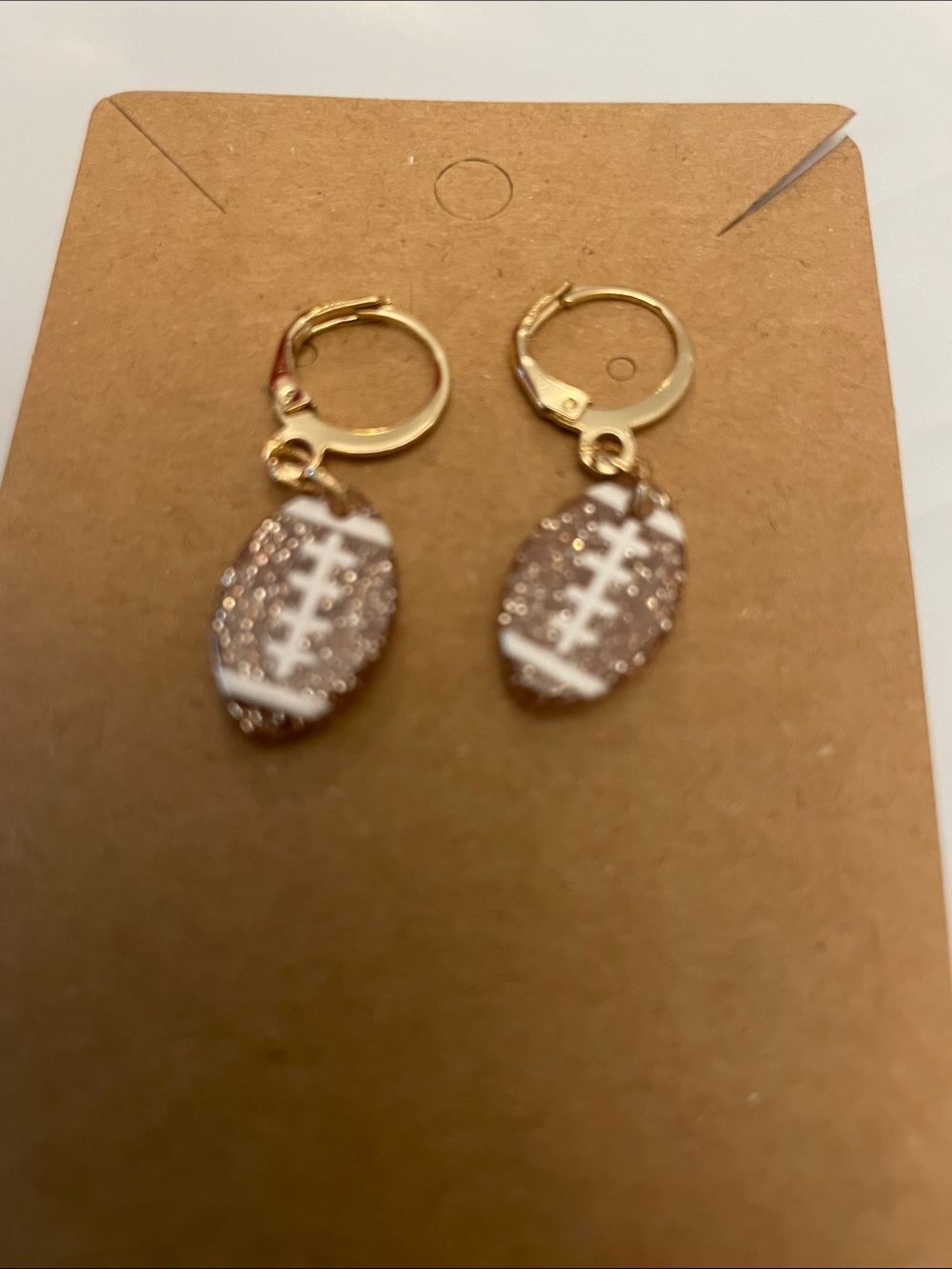 Gold Hoop Earrings with Rose Gold Glitter Football Charms